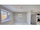 Open living space with wood-look floors and a large window at 115 Hollybrook Rd, Atlanta, GA 30349