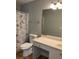 Bathroom with a vanity sink, toilet, shower and Paris themed shower curtain at 5027 Bayrose Cir # 27A, Atlanta, GA 30344