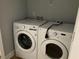 Laundry room featuring a large white LG washing machine and a dryer at 5027 Bayrose Cir # 27A, Atlanta, GA 30344