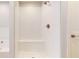 Elegant walk-in shower with white subway tile and a built-in bench at 637 Egrets Landing #51, Covington, GA 30014