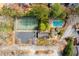 An aerial view showcasing community amenities: pool, tennis court, and ample parking at 17 Willow Ne Gln, Atlanta, GA 30342