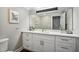 Bright bathroom featuring a modern vanity with white countertops and stylish decor at 17 Willow Ne Gln, Atlanta, GA 30342