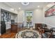 Office space with wood floors, a desk, a chair, and a window looking outside at 17 Willow Ne Gln, Atlanta, GA 30342