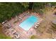 Overhead view of a swimming pool surrounded by lounge chairs and tables at 17 Willow Ne Gln, Atlanta, GA 30342