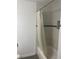 Bathroom featuring a shower/tub combo with grey tile surround at 23210 Plantation Ne Dr, Atlanta, GA 30324