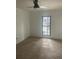 Bedroom with neutral carpet and a large window providing natural light at 23210 Plantation Ne Dr, Atlanta, GA 30324