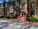 Inviting brick building facade with grand entrance, large windows, and well-maintained landscaping at 23210 Plantation Ne Dr, Atlanta, GA 30324