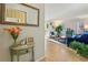 Charming entryway with hardwood floors and view into the spacious living room at 5153 Roswell Rd # 10, Atlanta, GA 30342