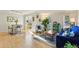 Bright living room with hardwood floors, large windows, and stylish furnishings at 5153 Roswell Rd # 10, Atlanta, GA 30342
