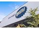 Exterior view of Gusto! sign against a white wall, with greenery adding to the scene at 5153 Roswell Rd # 10, Atlanta, GA 30342