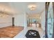 Elegant foyer with marble tile, chandelier, and view into a formal living space at 1725 Patriots Nw Way, Kennesaw, GA 30152