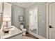 Well-lit bathroom featuring marble countertops, a modern toilet, and a glass-enclosed shower at 2629 Ashford Ne Rd, Brookhaven, GA 30319