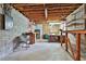 Unfinished basement space with exposed utilities, cinder block walls, and a concrete floor, offering potential for customization at 2941 Pine Valley Cir, East Point, GA 30344