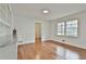 Dining room featuring hardwood floors, natural light, and built in shelving at 2941 Pine Valley Cir, East Point, GA 30344