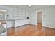 Dining room featuring hardwood floors and built-in shelving at 2941 Pine Valley Cir, East Point, GA 30344