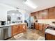 Beautiful kitchen featuring stainless steel appliances, stone countertops, and ample cabinet space at 530 Firethorn Ct, Villa Rica, GA 30180