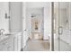 Bathroom with double vanity, glass shower and doors leading to other areas of the home at 96 Sheridan Dr, Atlanta, GA 30305