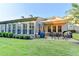 Back patio featuring an awning, grill, and outdoor seating, perfect for entertaining at 3220 Celebration Blvd, Suwanee, GA 30024