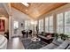 Bright living room featuring wood ceiling, skylight, hardwood floors, and an adjacent breakfast nook at 3220 Celebration Blvd, Suwanee, GA 30024