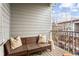 Relaxing balcony with outdoor seating provides a peaceful retreat and view of the surrounding neighborhood at 2111 Lilly Nw Way, Atlanta, GA 30318