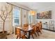 Bright dining room with a unique wooden table, modern lighting, and stylish decor at 2111 Lilly Nw Way, Atlanta, GA 30318