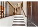 Inviting entryway features hardwood floors and a staircase leading to the upper level at 2111 Lilly Nw Way, Atlanta, GA 30318