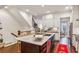 Bright kitchen features a large island with marble countertop, stainless steel appliances at 2111 Lilly Nw Way, Atlanta, GA 30318