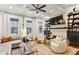 Living room showcasing fireplace and mantle with built-in shelves and cabinets at 2111 Lilly Nw Way, Atlanta, GA 30318