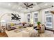 Bright living room features modern decor, coffered ceilings and lots of natural light at 2111 Lilly Nw Way, Atlanta, GA 30318