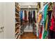 Spacious closet with custom organizers provides plenty of room for clothes, shoes, and accessories at 2111 Lilly Nw Way, Atlanta, GA 30318