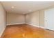 Spacious basement with stained concrete floors and a white door at 3894 Stone Lake Nw Dr, Kennesaw, GA 30152