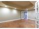 Spacious basement with stained concrete floors and recessed lighting at 3894 Stone Lake Nw Dr, Kennesaw, GA 30152