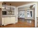 Open-concept basement area with a kitchenette, wet bar and windows with natural light at 3894 Stone Lake Nw Dr, Kennesaw, GA 30152