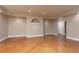 Spacious basement area with stained concrete floors and neutral paint at 3894 Stone Lake Nw Dr, Kennesaw, GA 30152