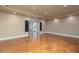 Finished basement features stained concrete floors, neutral walls, and access to outdoor space at 3894 Stone Lake Nw Dr, Kennesaw, GA 30152