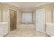 Bathroom with double vanities, tiled shower, and soaking tub at 3894 Stone Lake Nw Dr, Kennesaw, GA 30152