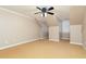 Neutral bedroom featuring a ceiling fan, and sloped ceilings at 3894 Stone Lake Nw Dr, Kennesaw, GA 30152