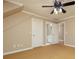 Neutral bedroom featuring a ceiling fan, closet, and ensuite bathroom at 3894 Stone Lake Nw Dr, Kennesaw, GA 30152