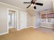 Bedroom with neutral walls, windows and a ceiling fan at 3894 Stone Lake Nw Dr, Kennesaw, GA 30152