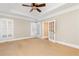 Inviting bedroom featuring ample natural light, trey ceiling and neutral carpet at 3894 Stone Lake Nw Dr, Kennesaw, GA 30152