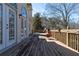 Large wooden deck with a railing, perfect for outdoor entertaining and enjoying the view at 3894 Stone Lake Nw Dr, Kennesaw, GA 30152