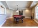 Spacious game room with a pool table, neutral walls, and stained concrete floors at 3894 Stone Lake Nw Dr, Kennesaw, GA 30152