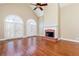 Living room with fireplace, French doors, and hardwood floors at 3894 Stone Lake Nw Dr, Kennesaw, GA 30152