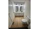 Modern bathroom with double granite vanity and stylish black framed mirrors at 1753 Lee St, Decatur, GA 30035