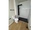 Bathroom featuring stylish black shower with a black rainfall shower head at 1753 Lee St, Decatur, GA 30035