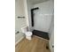 Bathroom featuring stylish black shower with a black rainfall shower head at 1753 Lee St, Decatur, GA 30035