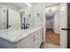 Bright bathroom featuring a marble countertop, black fixtures, and tile floors at 5328 Monticello Dr, Villa Rica, GA 30180