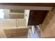 A well-lit bathroom featuring a vanity with dark wood cabinets, and tile floors at 898 Oak # 3421, Atlanta, GA 30310