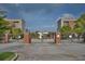 Gated community entrance with brick pillars and manicured landscaping at 898 Oak # 3421, Atlanta, GA 30310