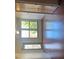 Bright living room featuring windows and beautiful hardwood floors at 898 Oak # 3421, Atlanta, GA 30310